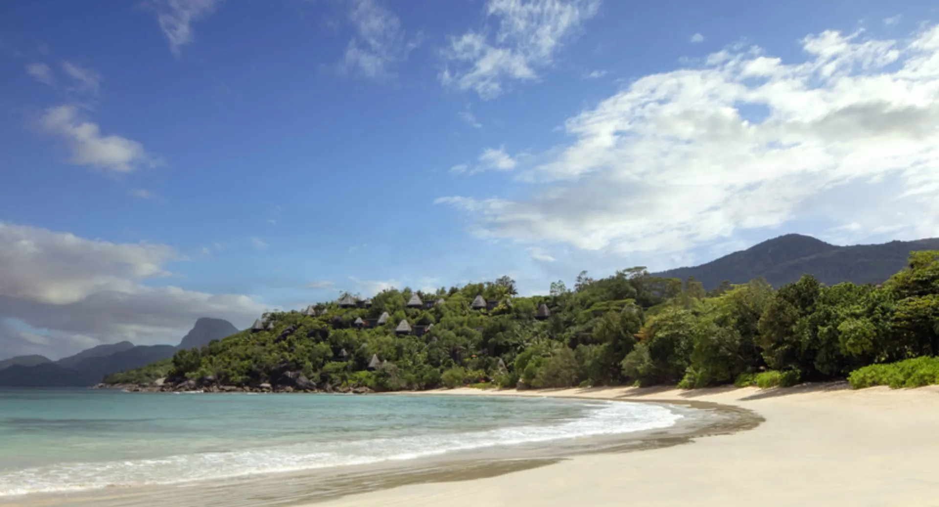 Beachfront setting at Anantara Maia Seychelles Villas on Mahé
