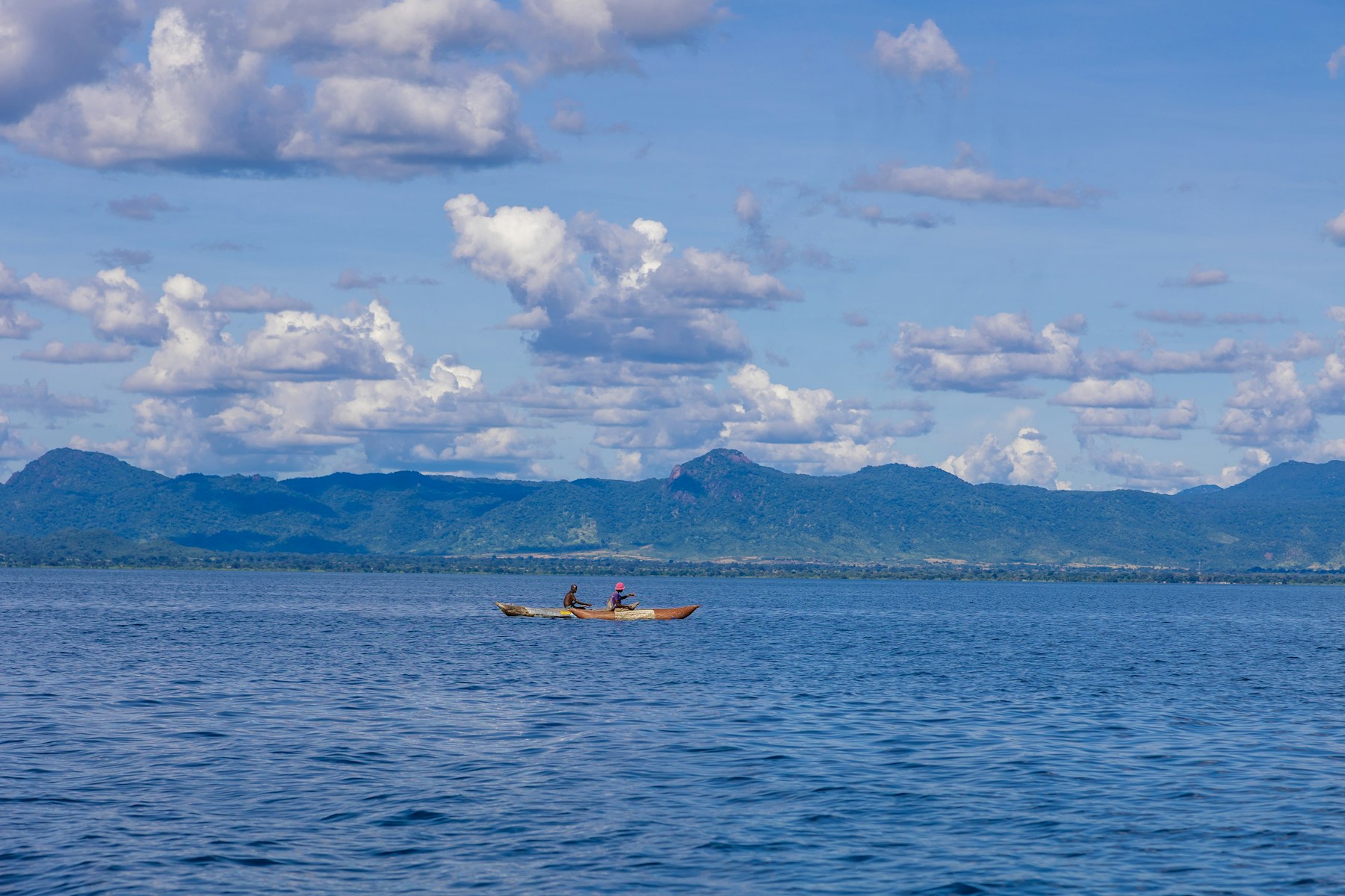 Lake Malawi with mountains and small boats