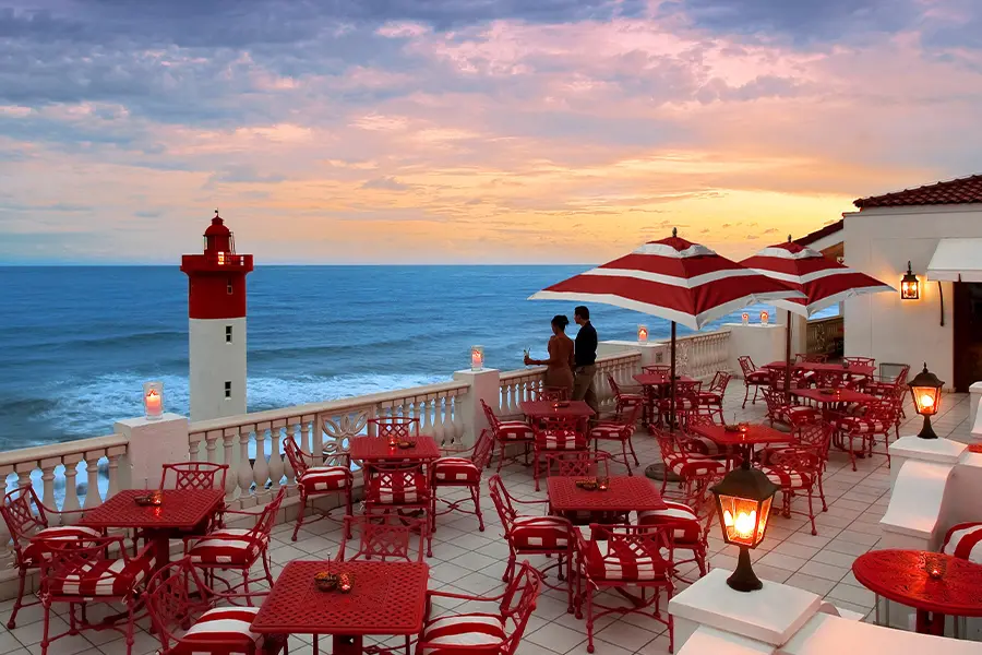The Oyster Box hotel and lighthouse on the Umhlanga coast in South Africa